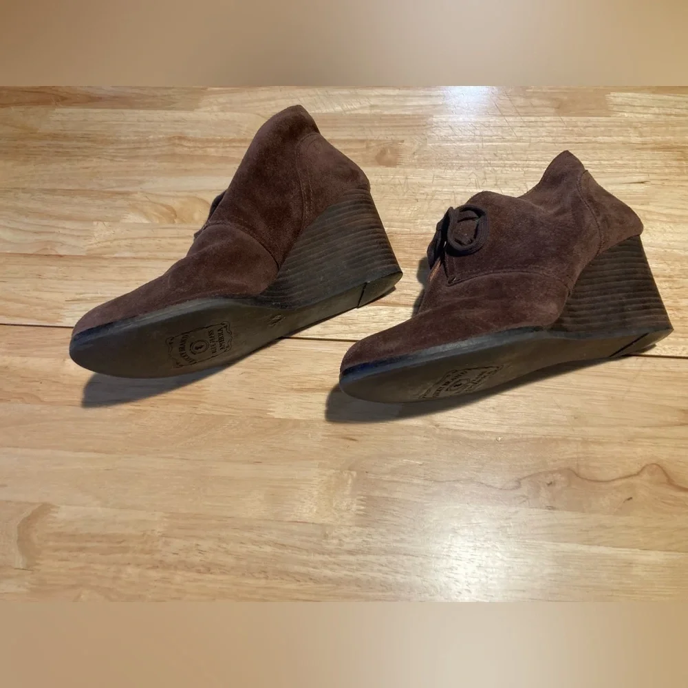 Lucky Brand wedged boots in size 9 1/2 M with an approximate 2 1/2 inch heel
